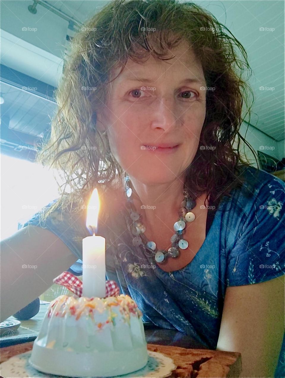 Today is the beautiful lady’s birthday and she’s celebrating it with a piece of cake and a candle in “Straubing”, “Lower Bavaria”. 2024. Hypnotic Productions