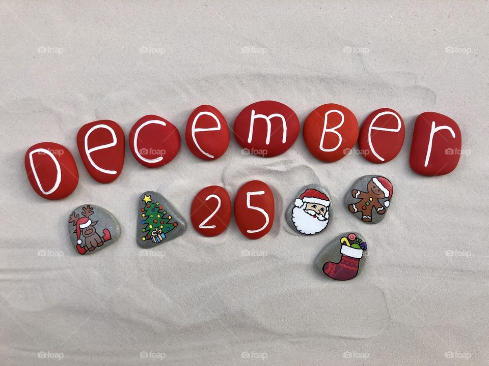 25 December, calendar date with colored stone for a Merry Christmas