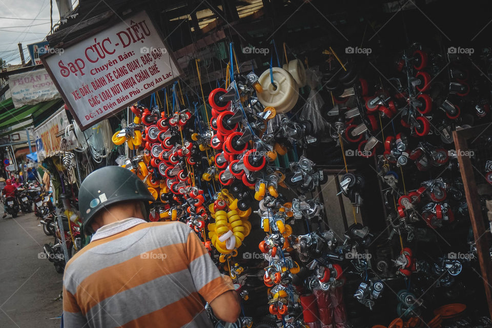 Man buying wheels in Vietnam 