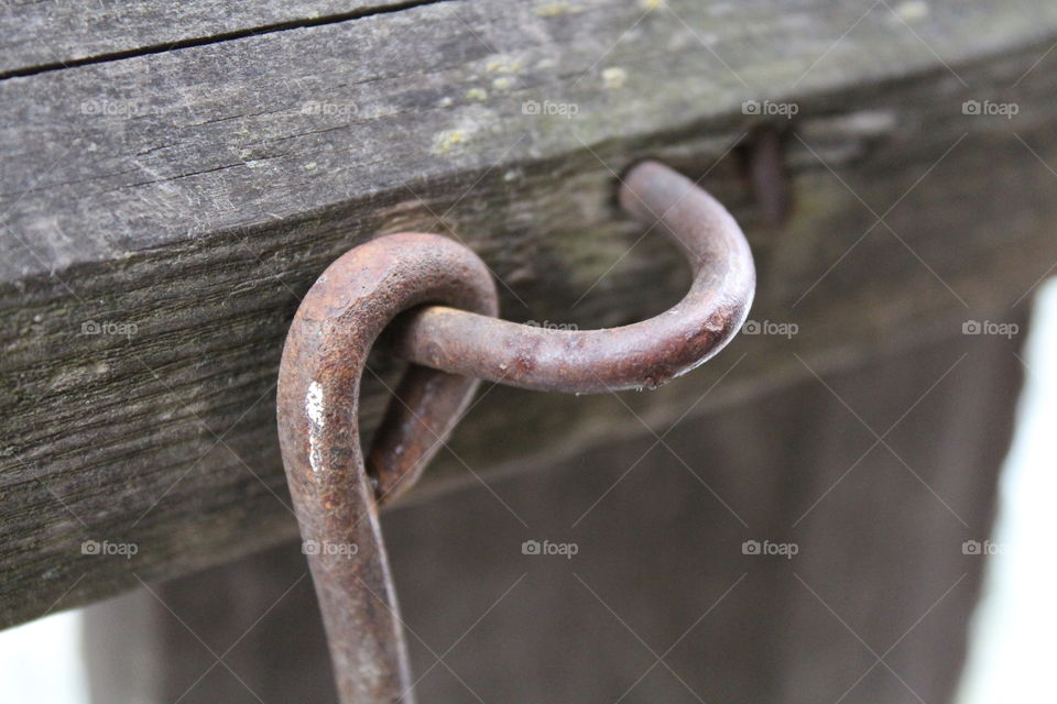 Old rusted iron lock and old wood
