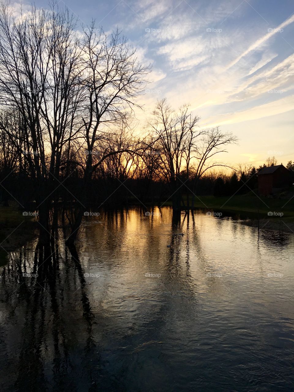 Sunset on flooded river
