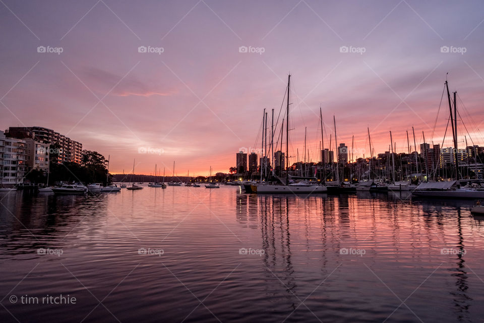Light clouds whispering past Sydney’s Rushcutters Bay at sunrise
