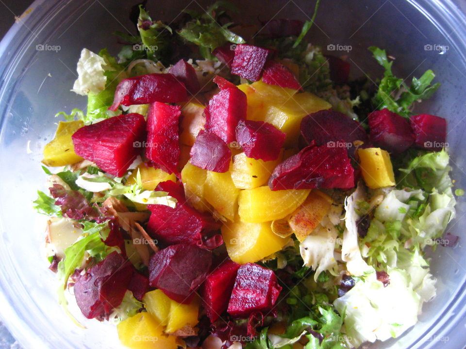 Red and Gold Beet Salad. Fresh organic salad with frisée, red leaf lettuce, fennel, and red and gold beets. All ingredients purchased at Berkeley Bowl in Berkeley, California.   