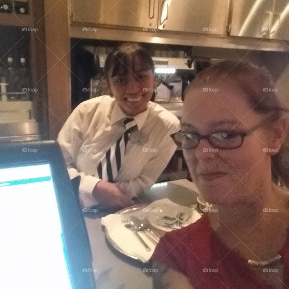 Asian and caucasian taking a selfie