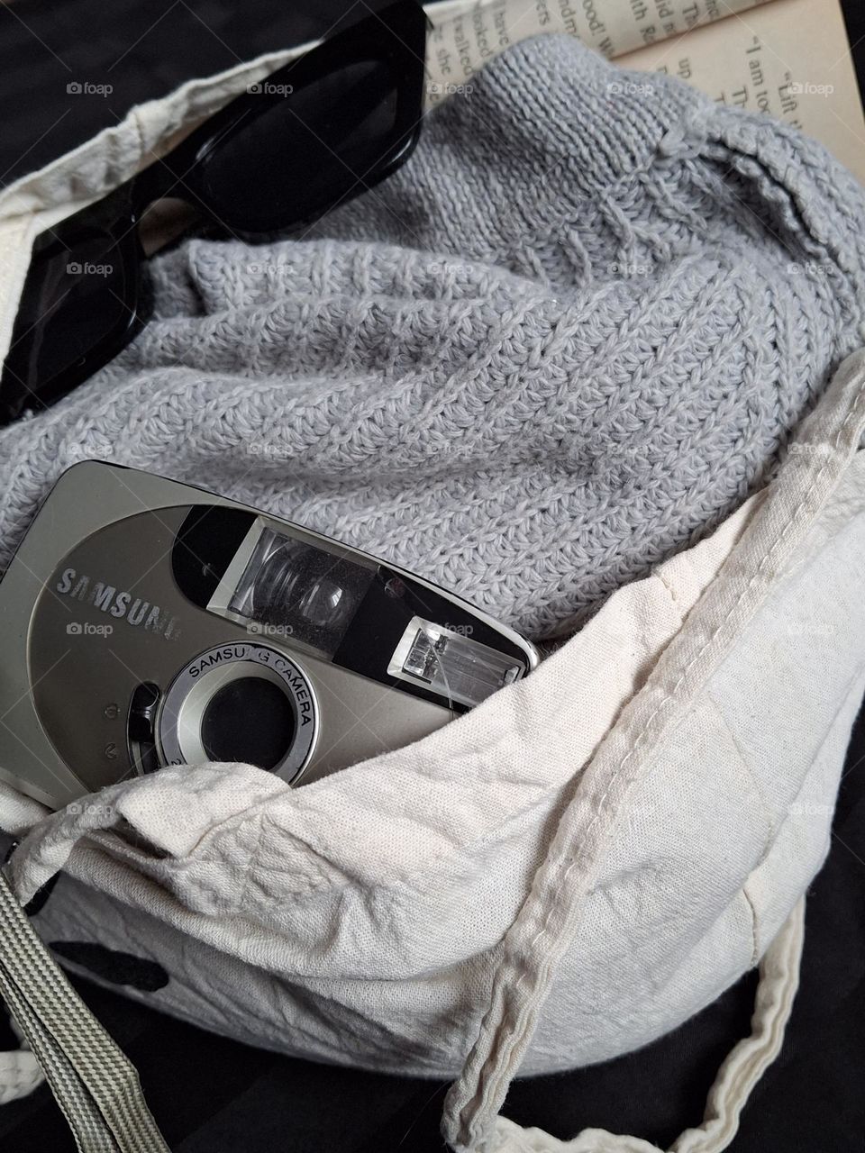 image with retro props lying in an eco bag on a black background