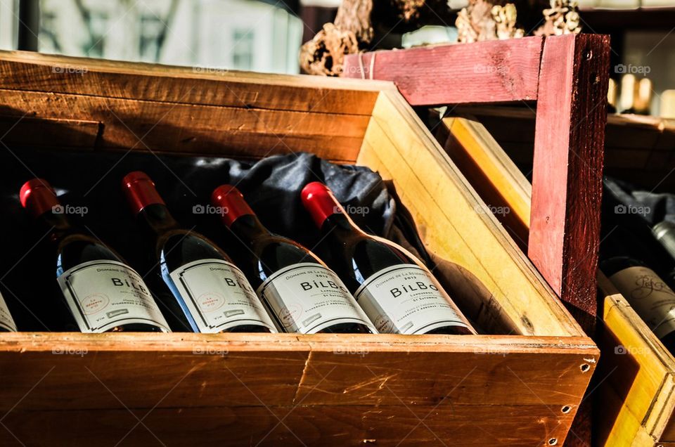  Red wine . Red wine bottles in a wooden box