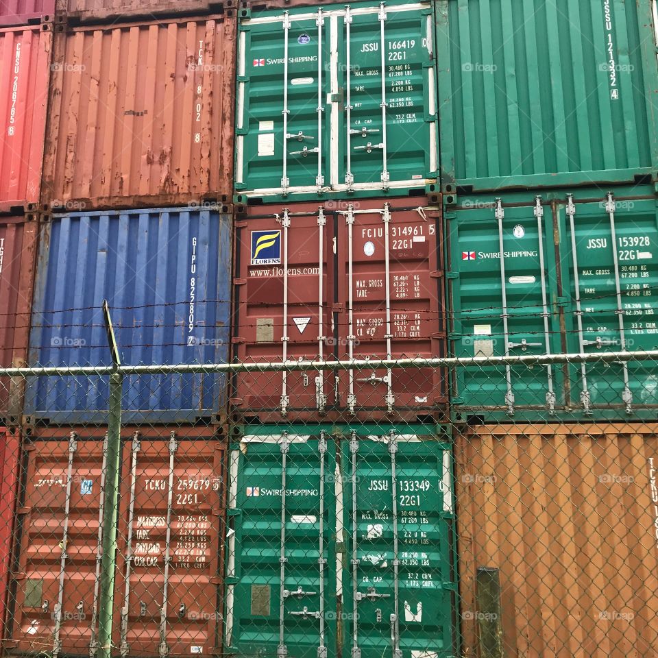 Colorful containers waiting to be loaded in port