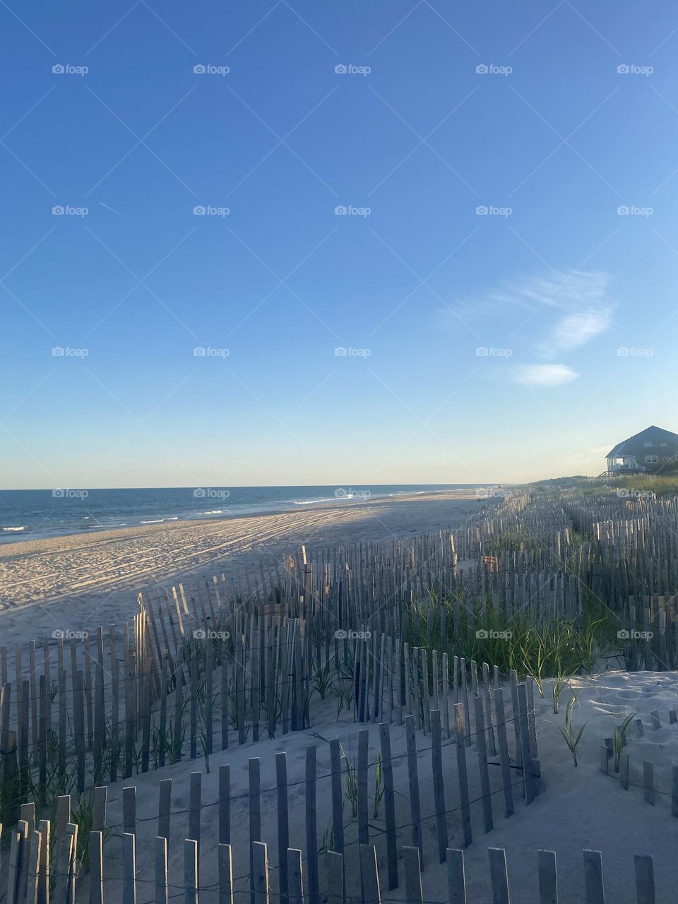 Summer beach walk at dusk 