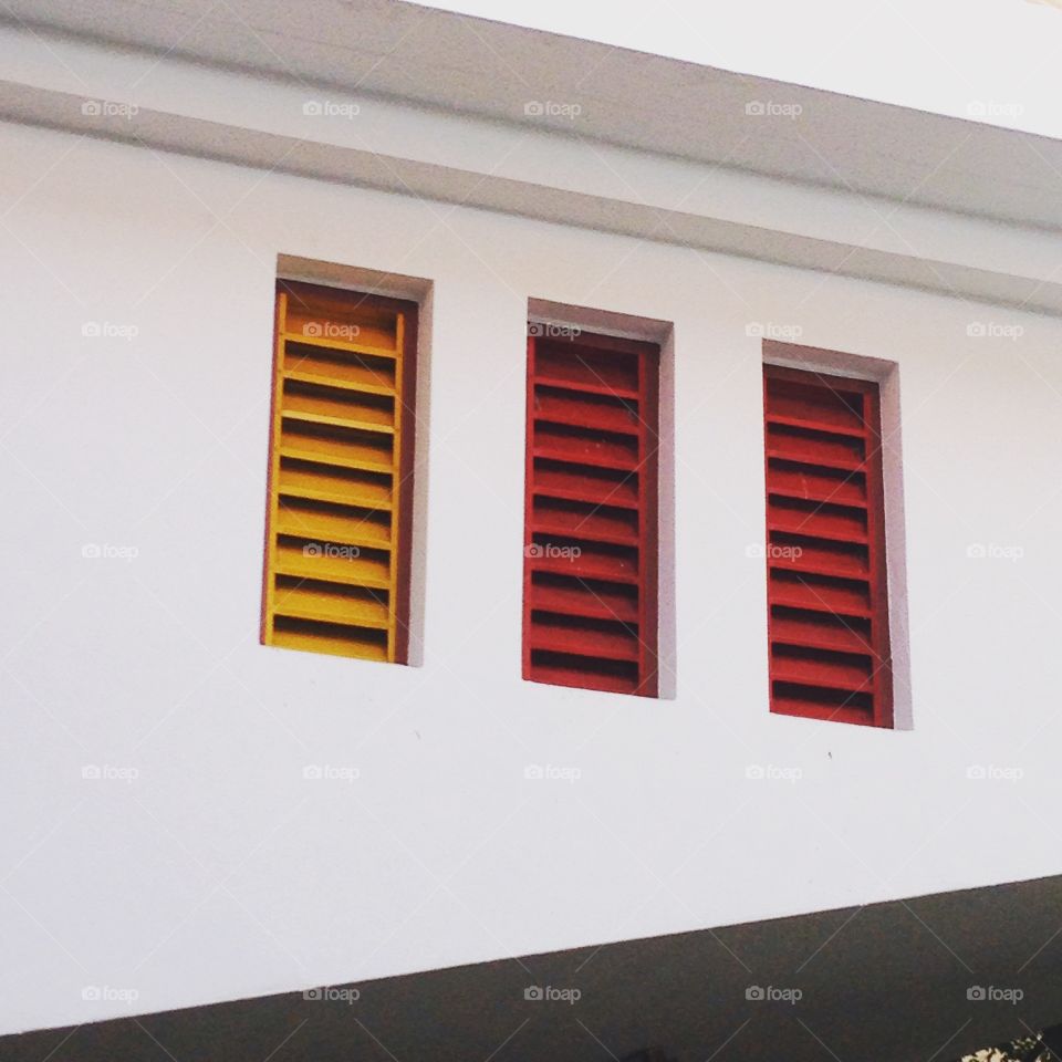 Yellow and red windows. Three window is yellow and red