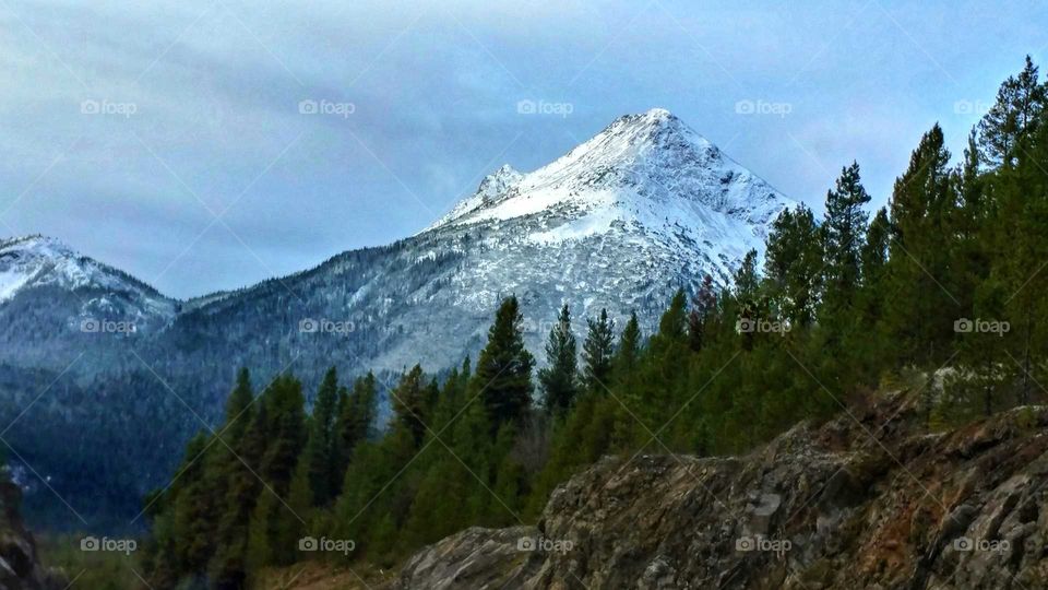Spectacular late fall blue sky day in the majestic snow covered mountains of British Columbia.