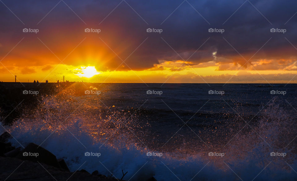 sunset on sea waves