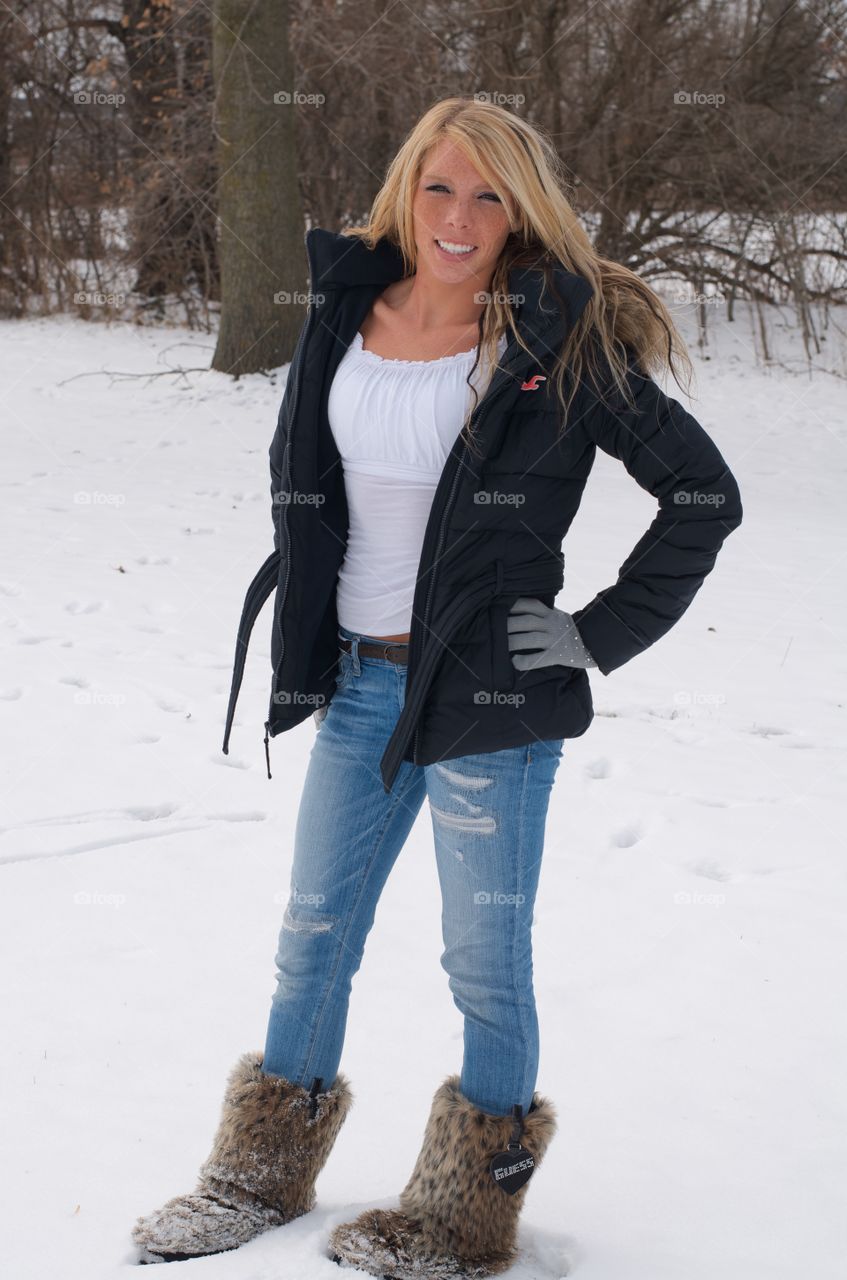 Parka in the snow. Girl with her parka on in the snow