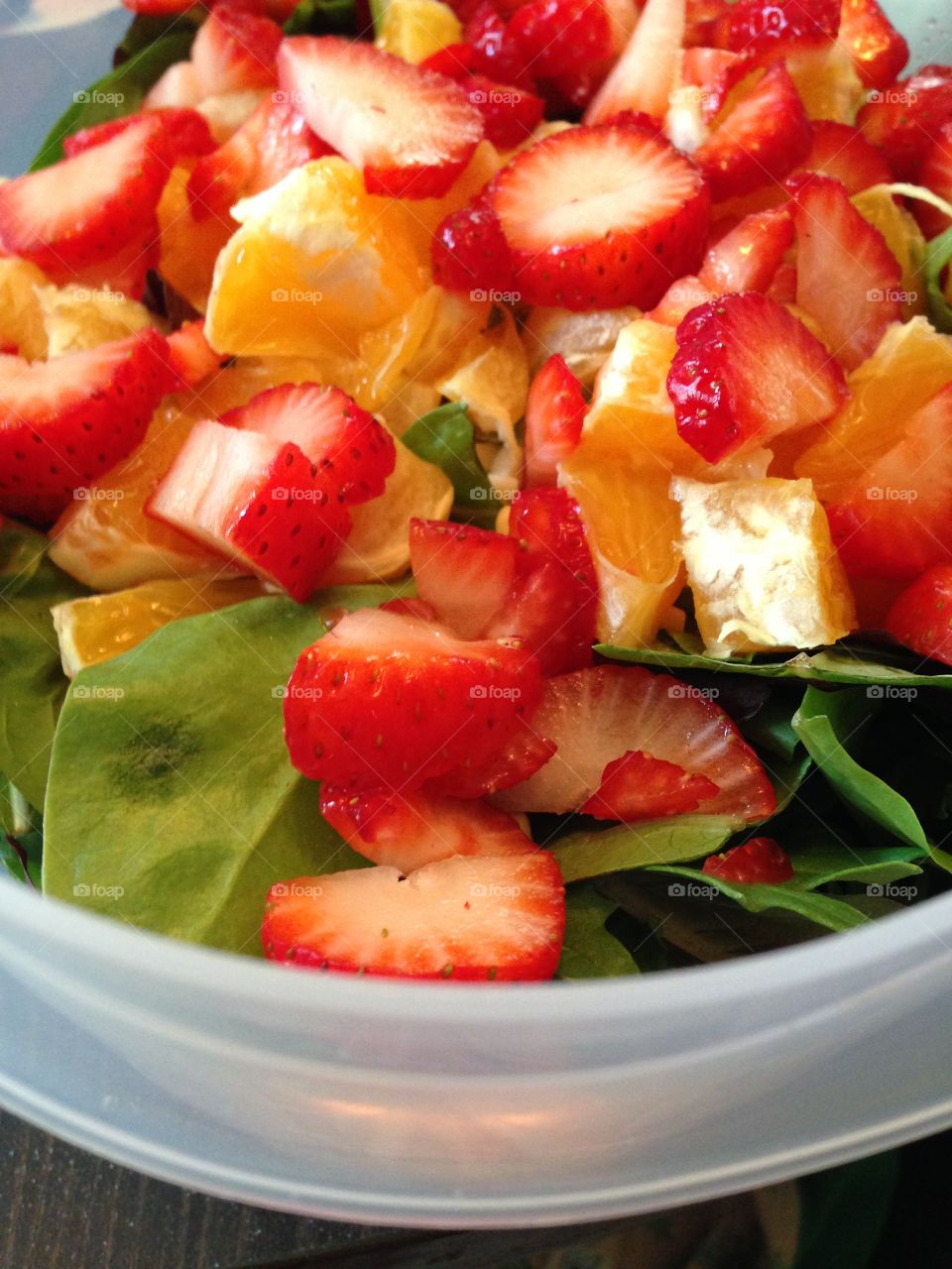 Summer salad with strawberries and oranges.