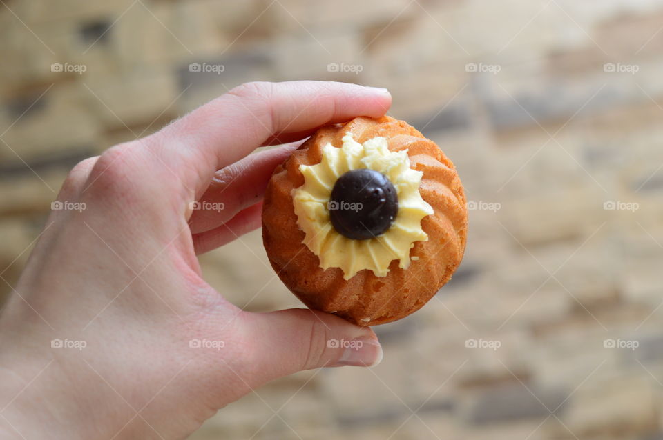 Unhealthy food in human hand