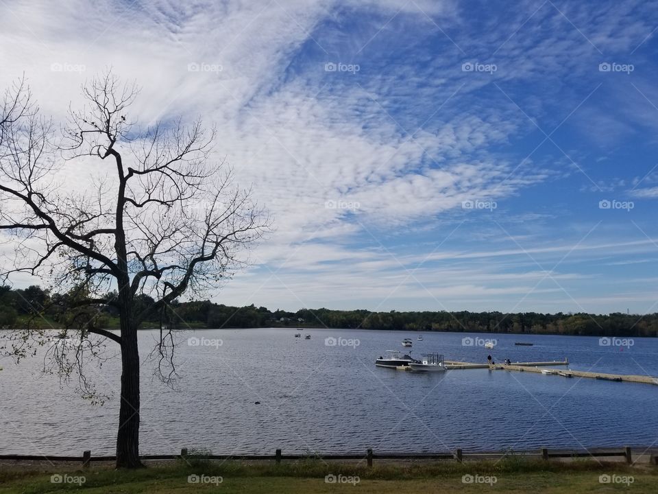 A beautiful lake with a dock in Wethersfield Cove.