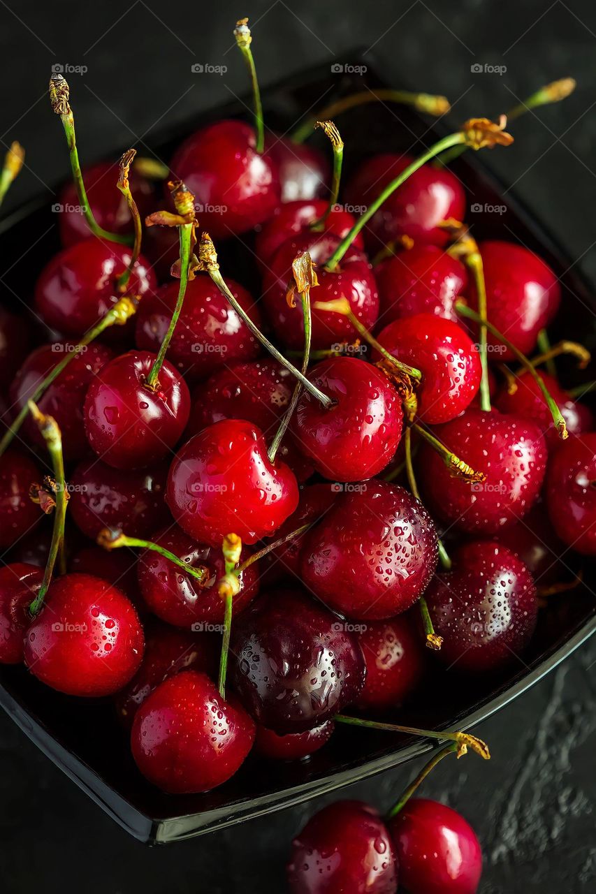 Overhead view of bright red cherries Overhead view of bright red cherries in a bowl.