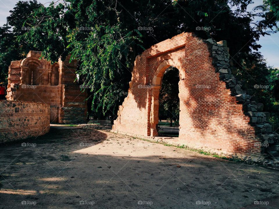 Arch and other ruins