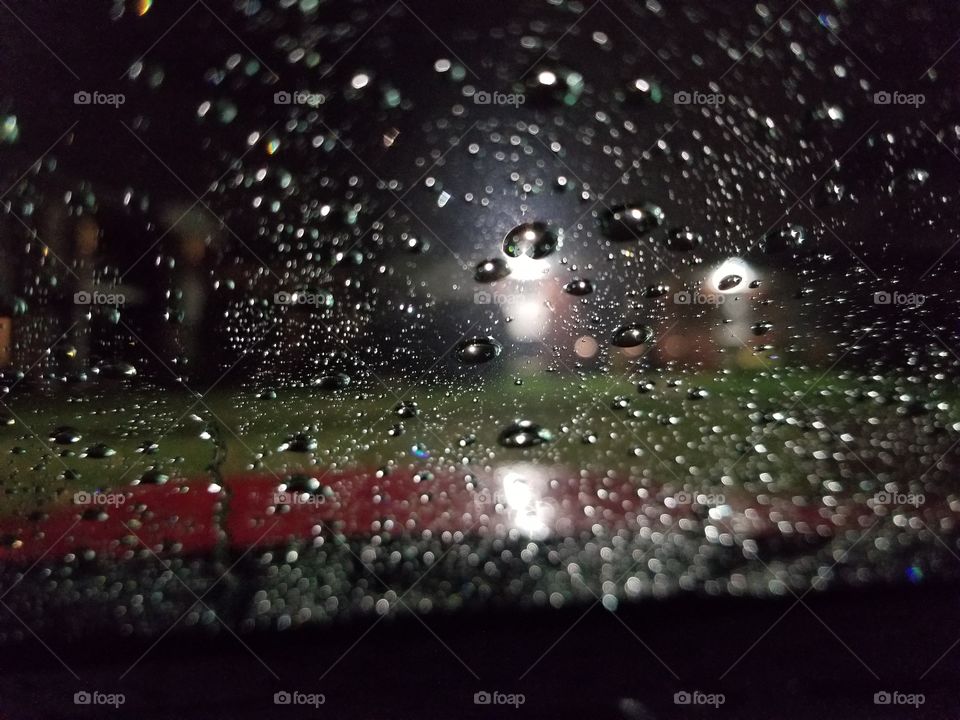 A glance through the rained windshield