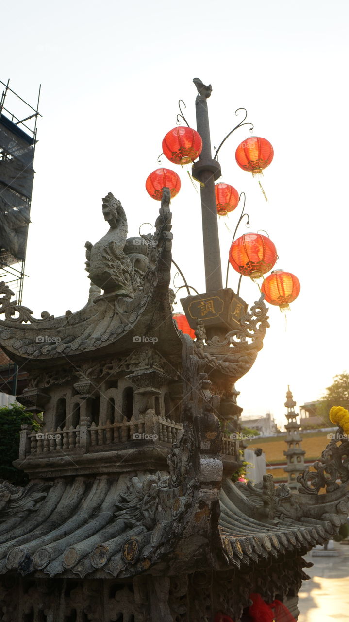 Chinese style stone pavilion and red Lantern in Wat Suthat