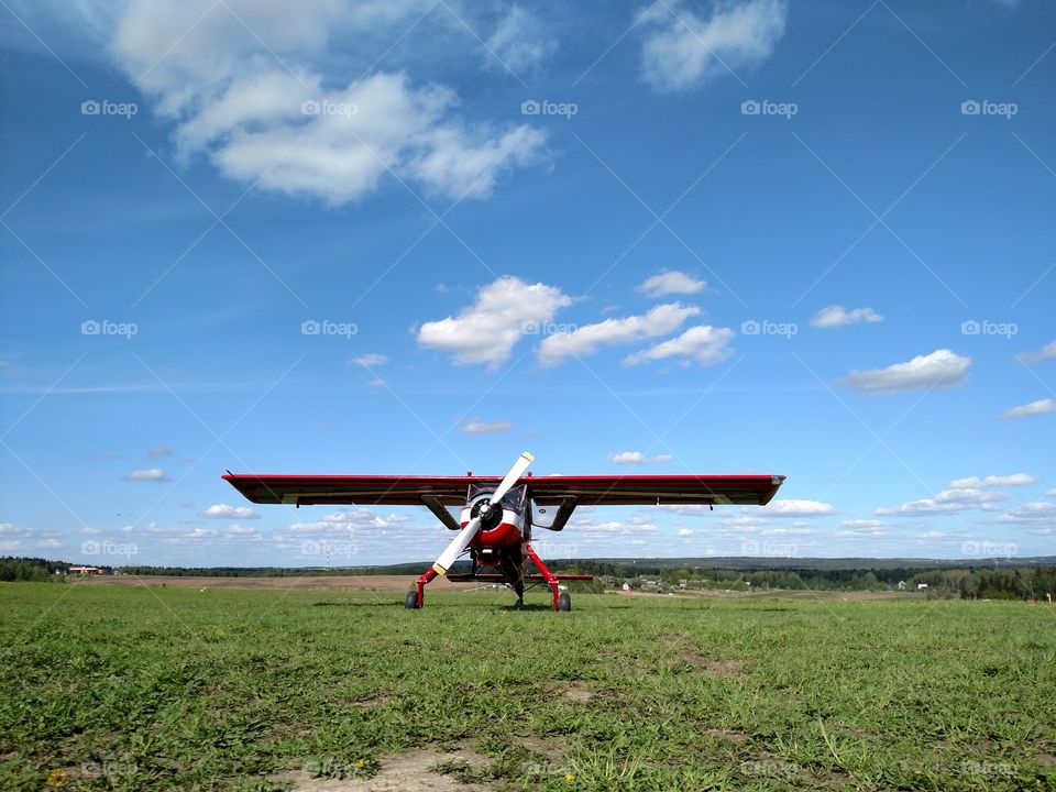 sport airplane ready to flight. aero club in the middle of russian country side