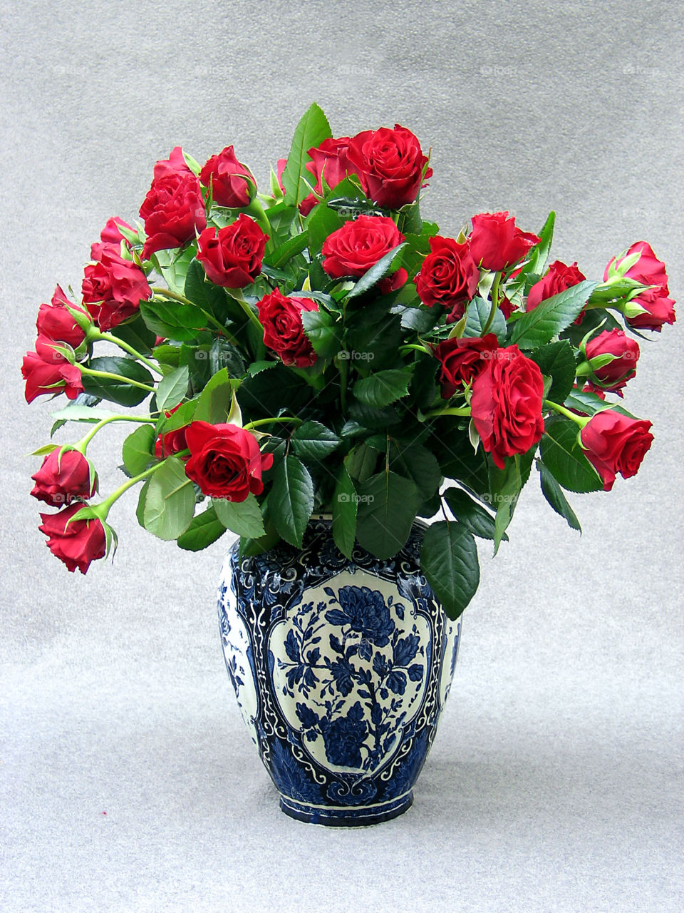 Delft vase with a bunch of roses