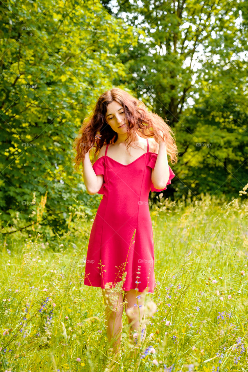 Red dress in the outdoors summer 