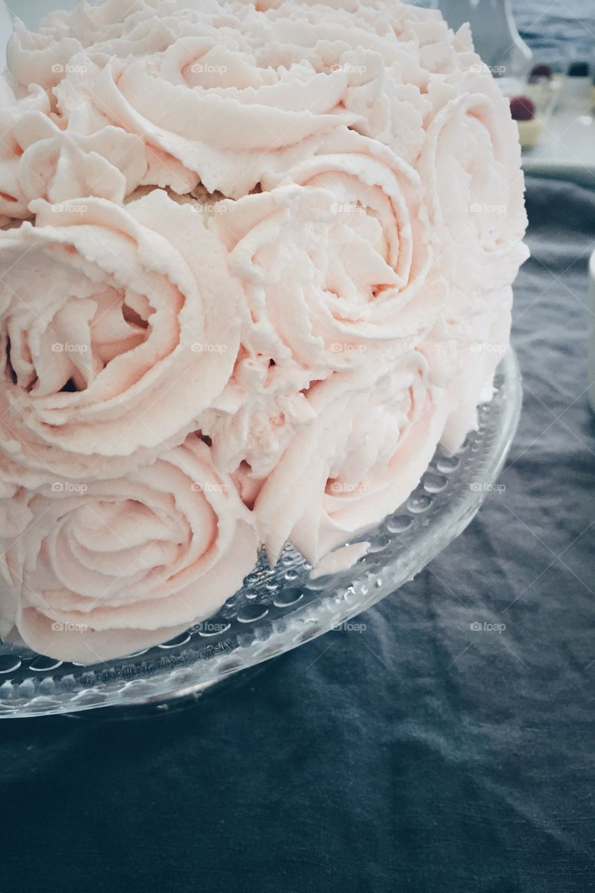 Birthday cake with pink buttercream rose frosting