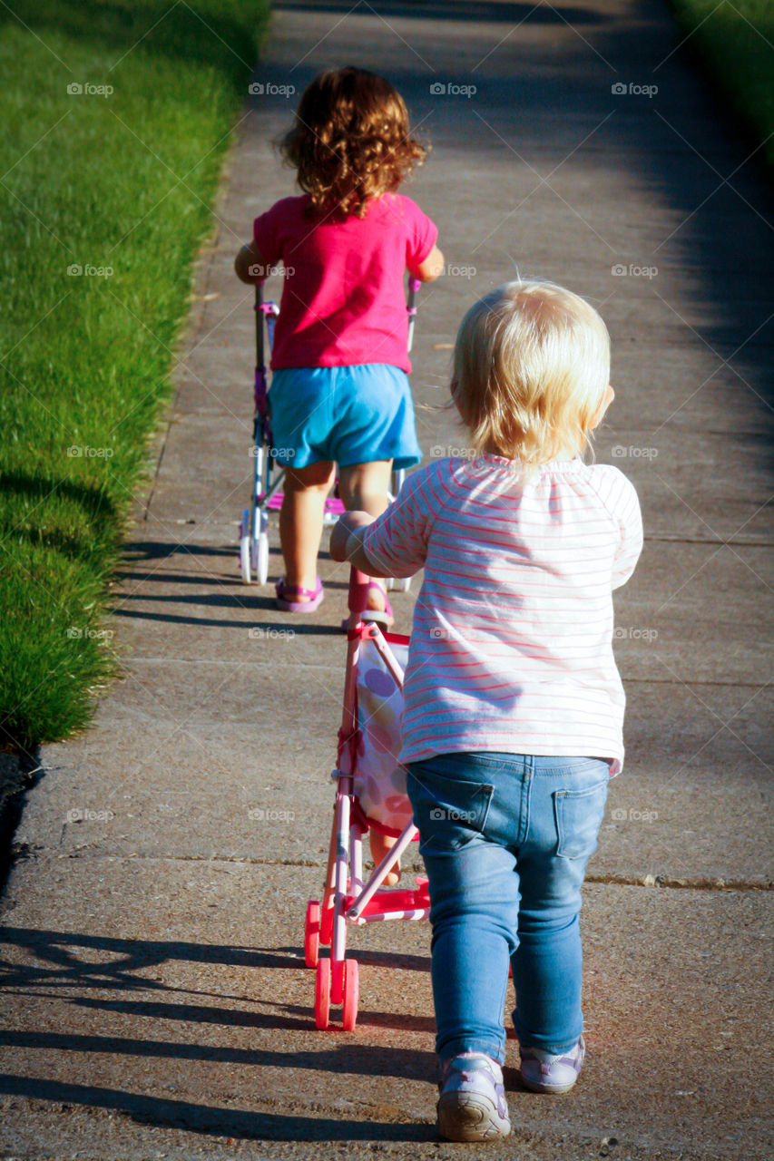 Toddlers with strollers 