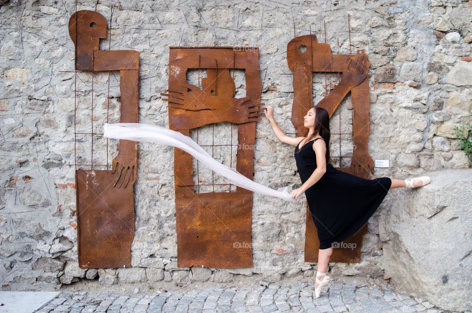 Young Female Ballerina Dancing with a Scarf Outside