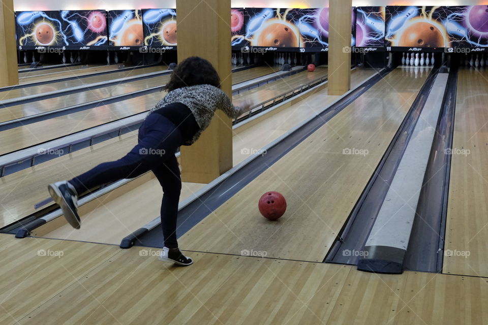 Woman playing bowling