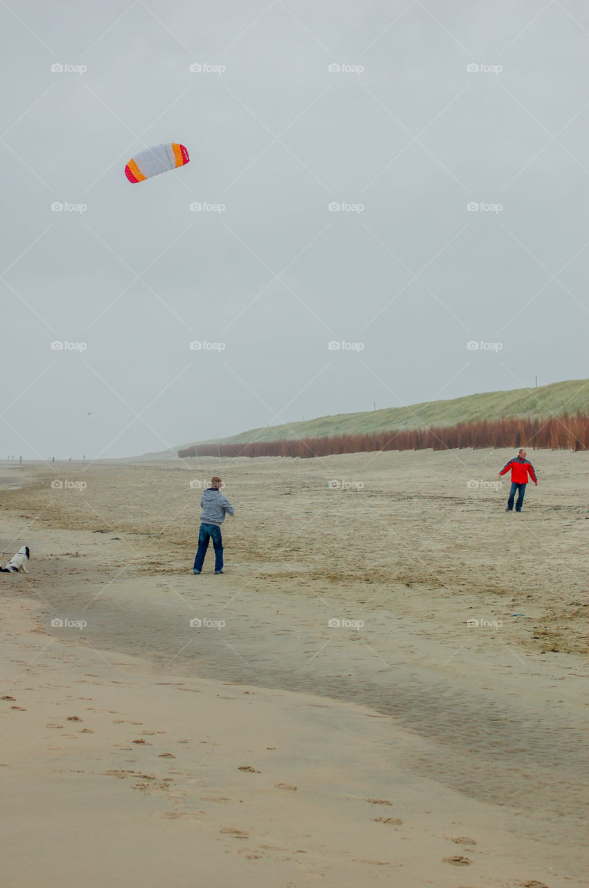 Playing Kite On The Beach At Texel The Netherlands