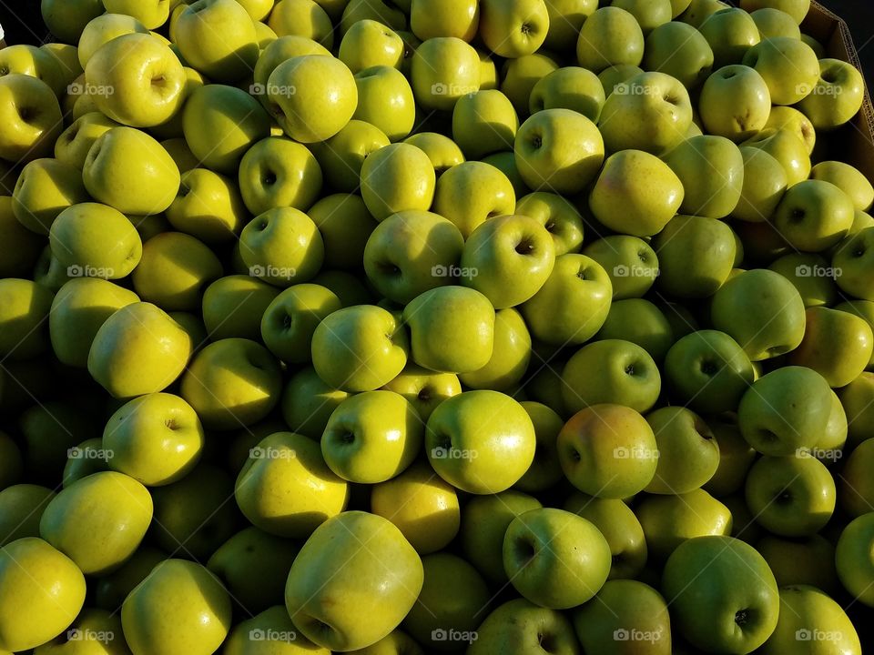 A group of green apples