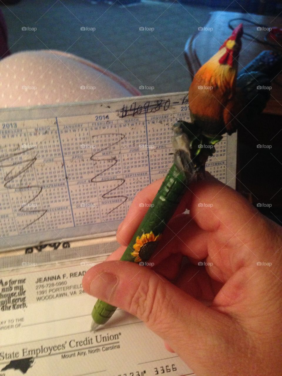 Paying bills with my rooster pen!