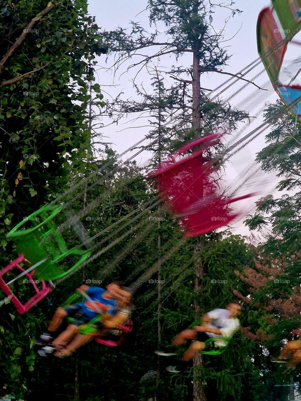 Vintage carousel with chains.