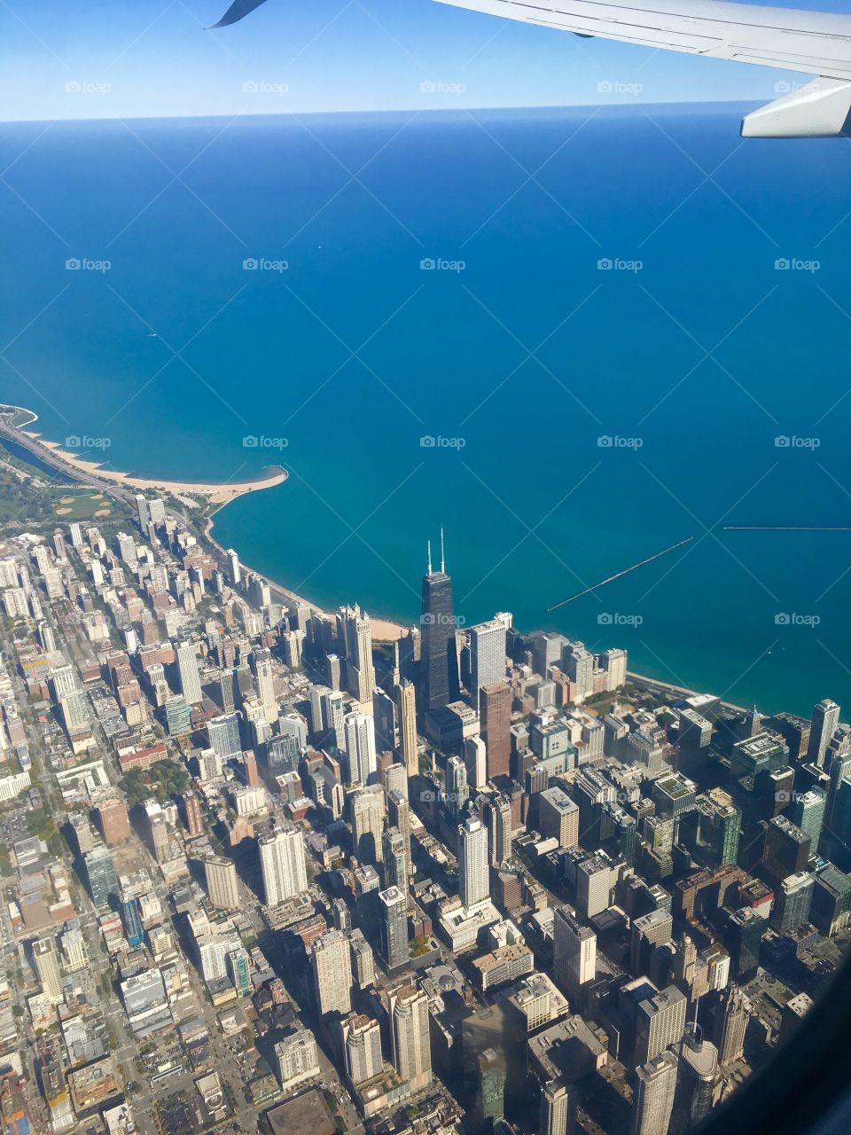 A view from the plane of Chicago along the coast of Lake Michigan.