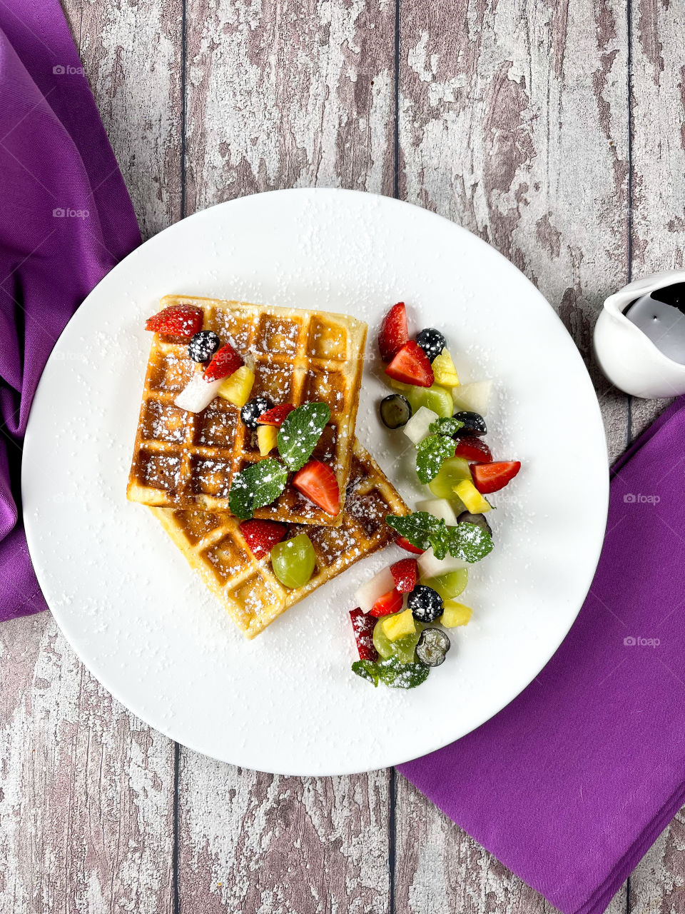 Belgia waffles with fruits on a plate