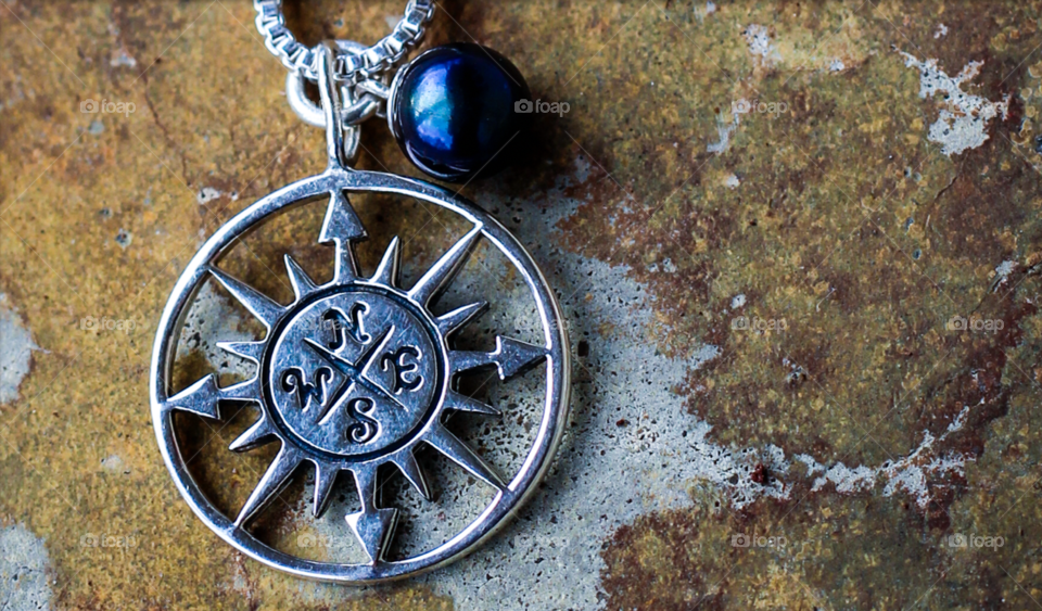 Jewelry that is beautiful and contains a pearl on top of great stone. 