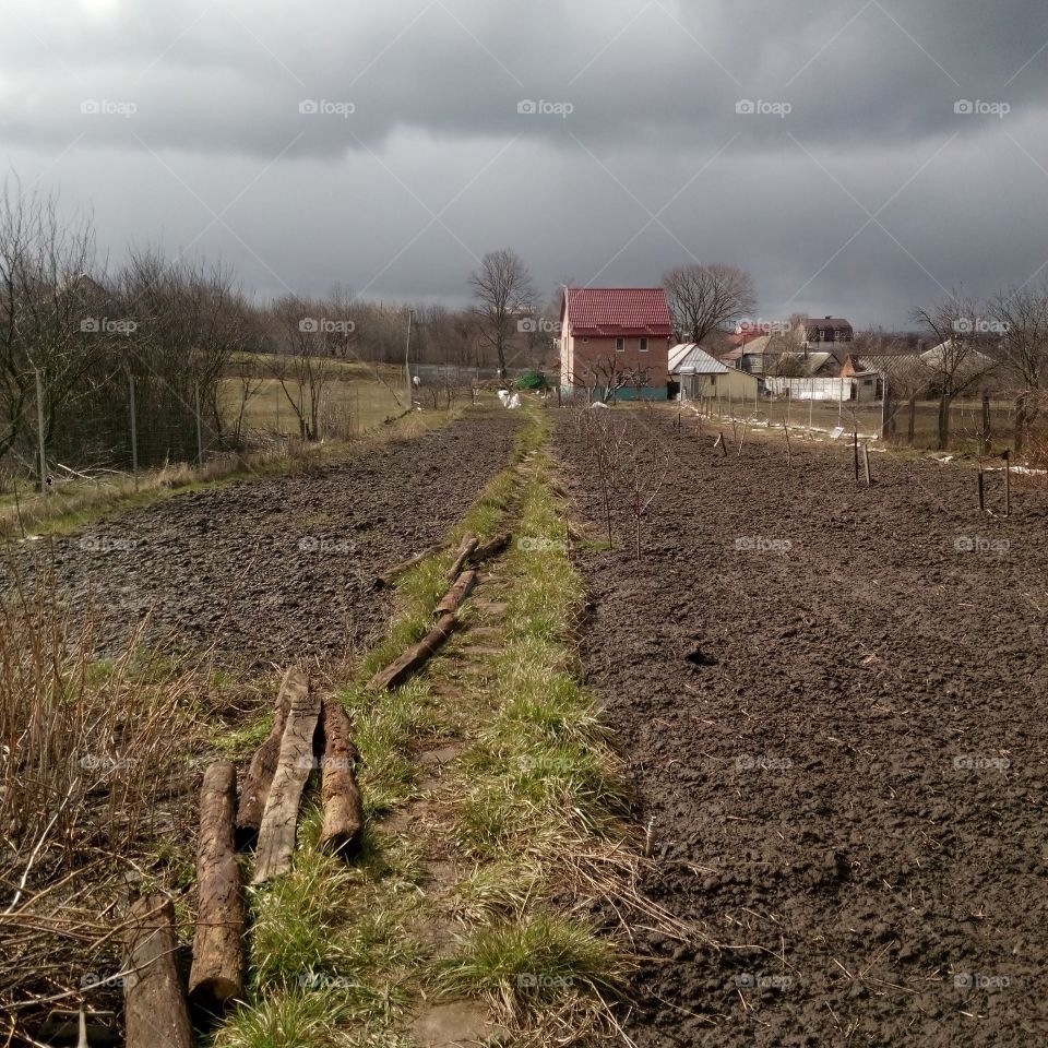 road through a plowed field