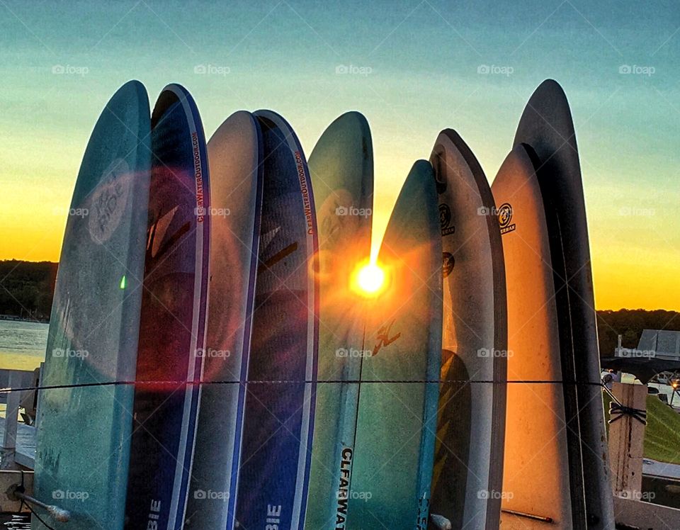 Paddle boards in the evening sun