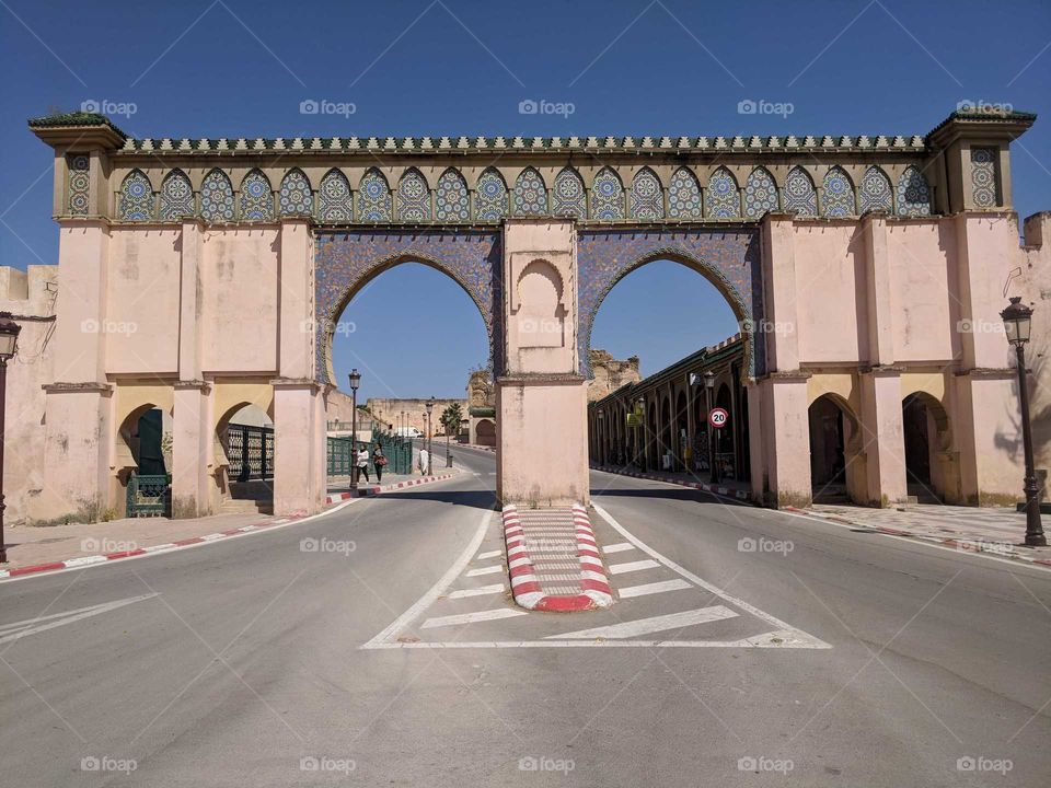 Beautiful, Ornate Arch/Gate/Bridge over the Road Covered in Colorful Mosaic Detailing in Meknes, Morocco