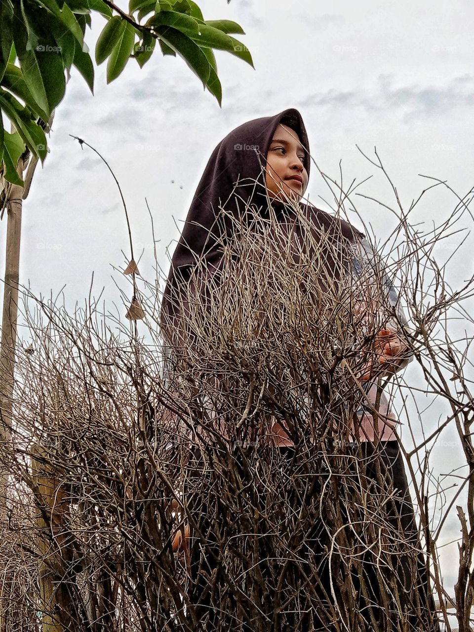 A woman is enjoying the natural scenery.