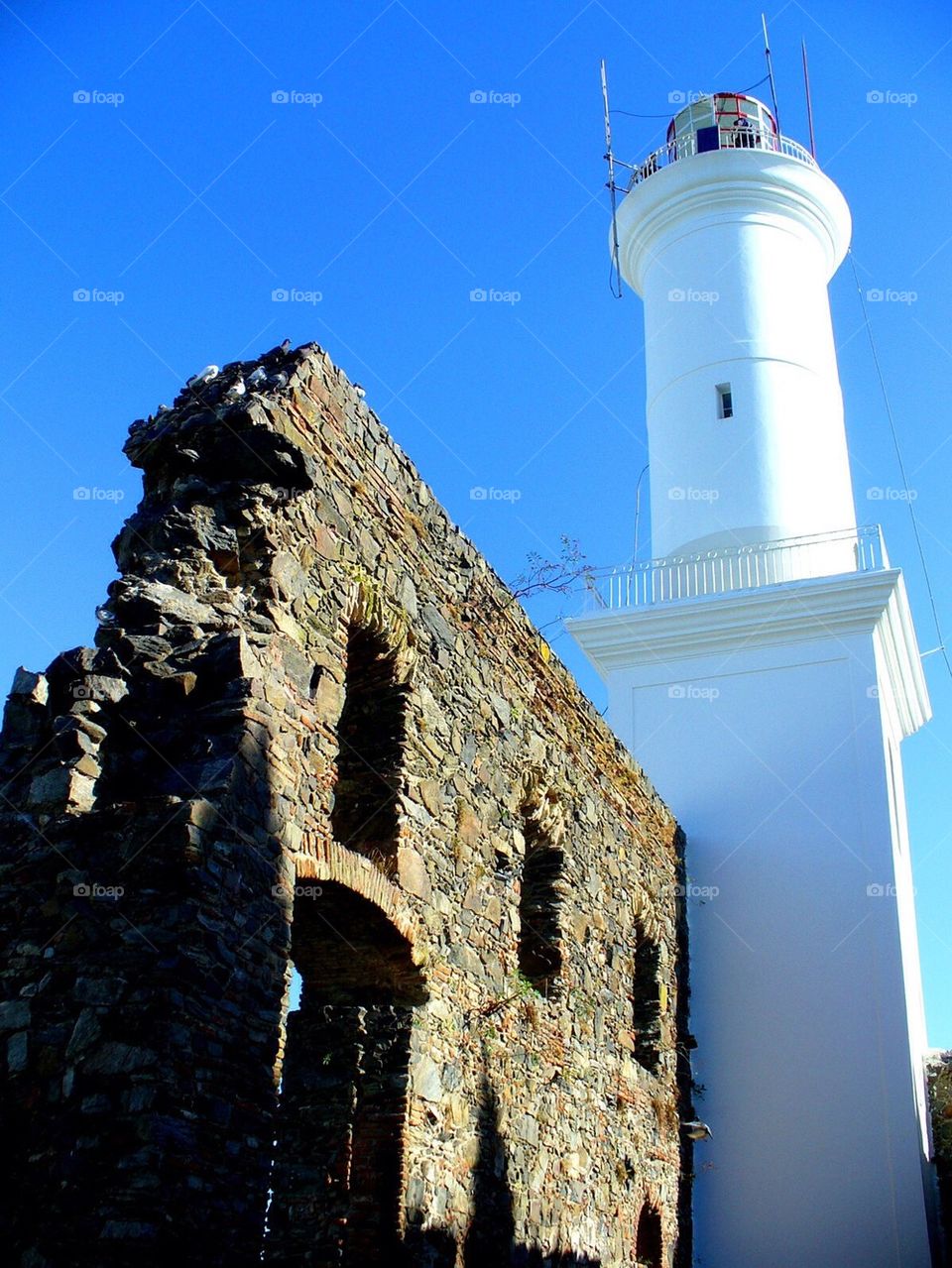 Lighthouse at colonia del sacramento and san francisco ruins