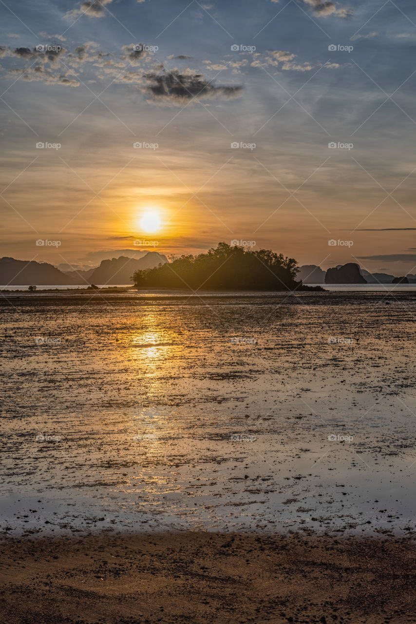 Sunrise above cute island