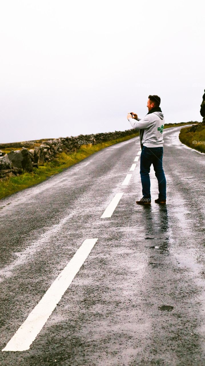 Man capturing moments on his phone 