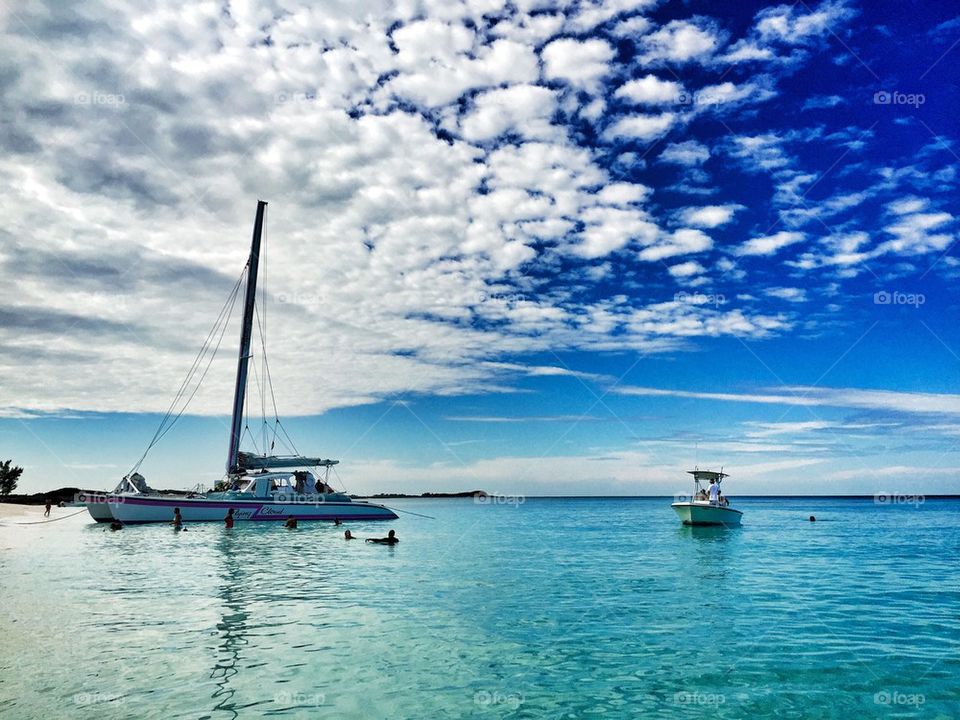 Scenic view of boats sailing in sea