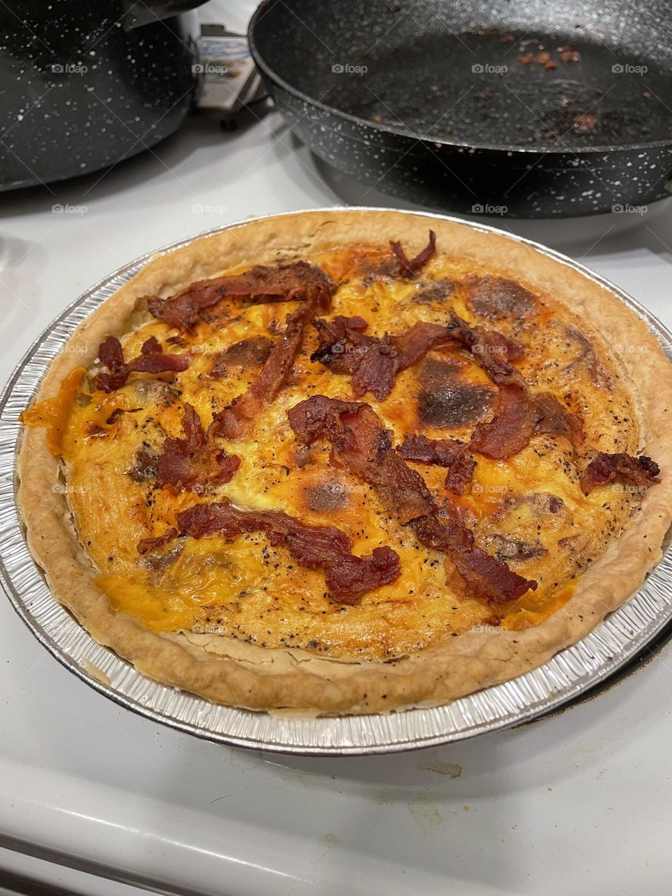 Homemade bacon and cheese quiche fresh out of oven