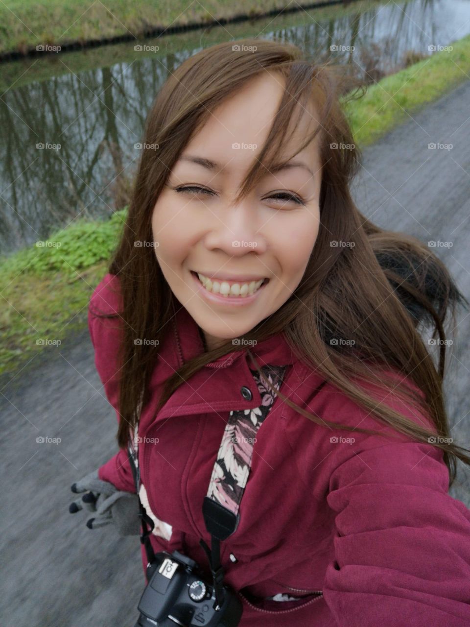 Girl smile happy woman Asian selfie walking street cold relaxing long hair charming gorgeous water winter exercise outdoor park cute beautiful pretty grass coat nature enjoy 