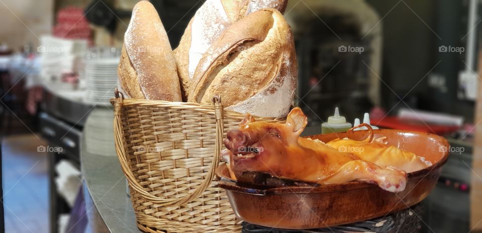 sucking pig with bread