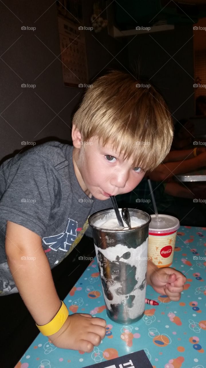milkshake time. my son at Jonny rockets