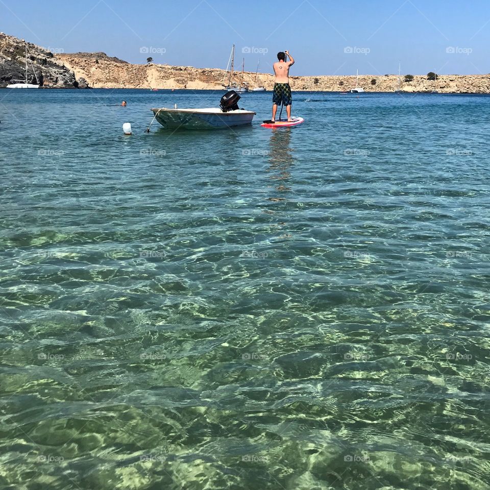 Paddleboarding in lindos Greece 